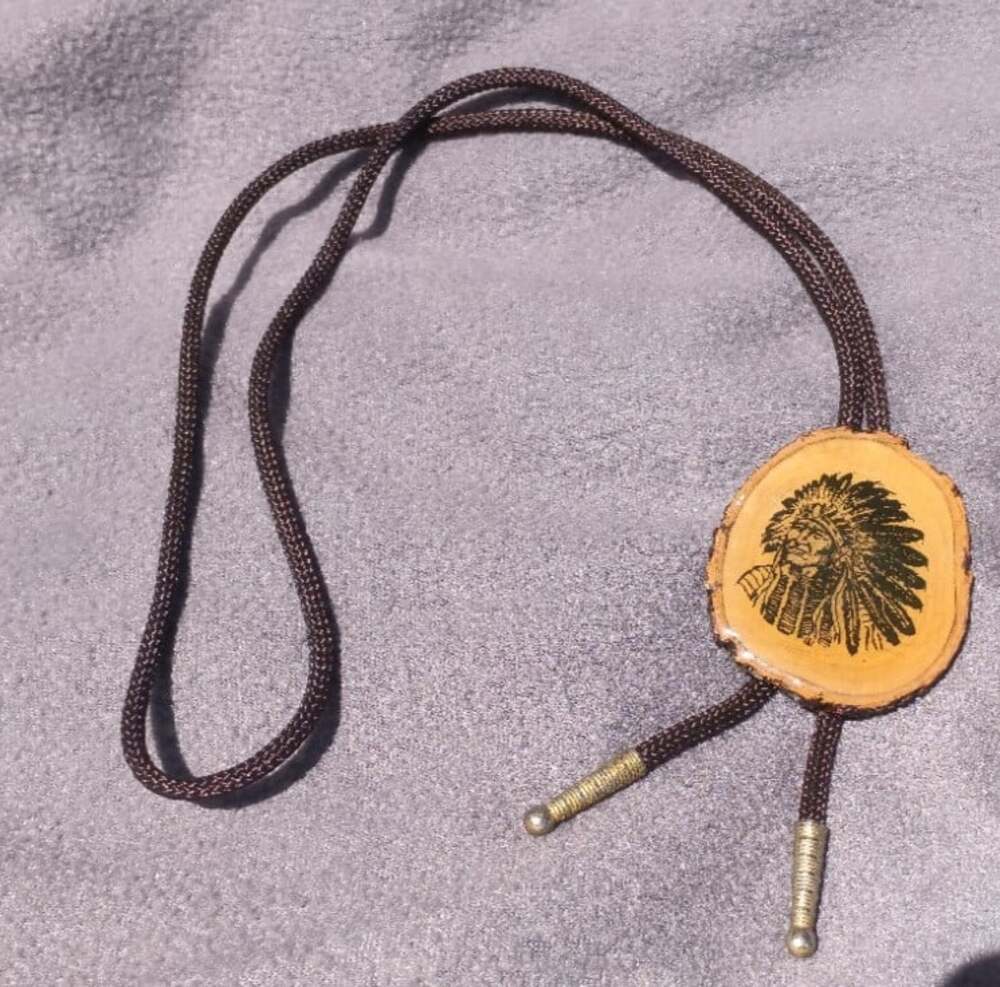Vintage 1970s Bolo Tie Chief Engraved Wood Disc Brown Cord Brass Tips Western - Picture 2 of 4